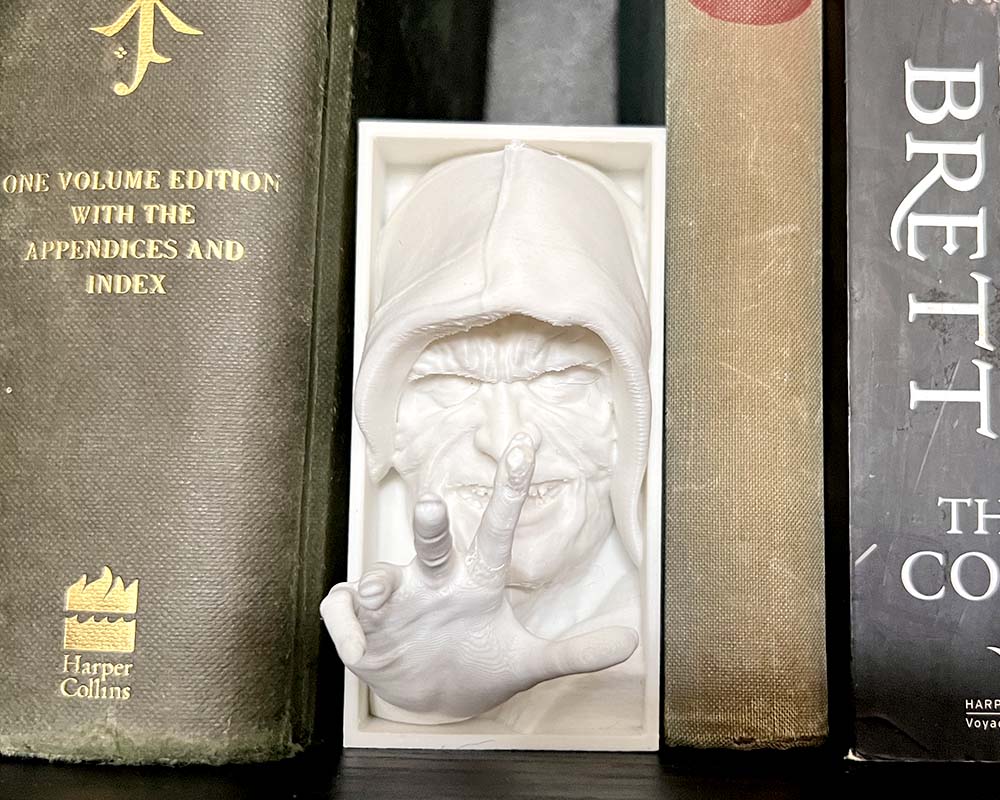 Palpatine book nook with lightning fingers Star Wars inspired 3D printed Emperor Palpatine Sith Lord shelf insert Dark Side book nook gift for Star Wars fans and collectors Hooded Palpatine book nook with Force lightning effect Star Wars bookshelf décor featuring Emperor Palpatine