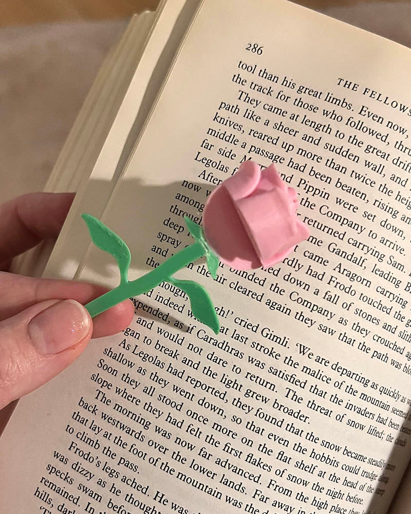 3D printed rose bookmark with detailed flower and thorn stem, Floral book accessory with a 3D rose peeking out of a book, Handmade rose bookmark gift for readers and book lovers
