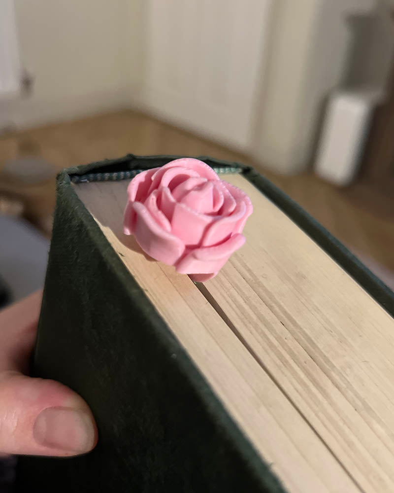 3D printed rose bookmark with detailed flower and thorn stem, Floral book accessory with a 3D rose peeking out of a book, Handmade rose bookmark gift for readers and book lovers