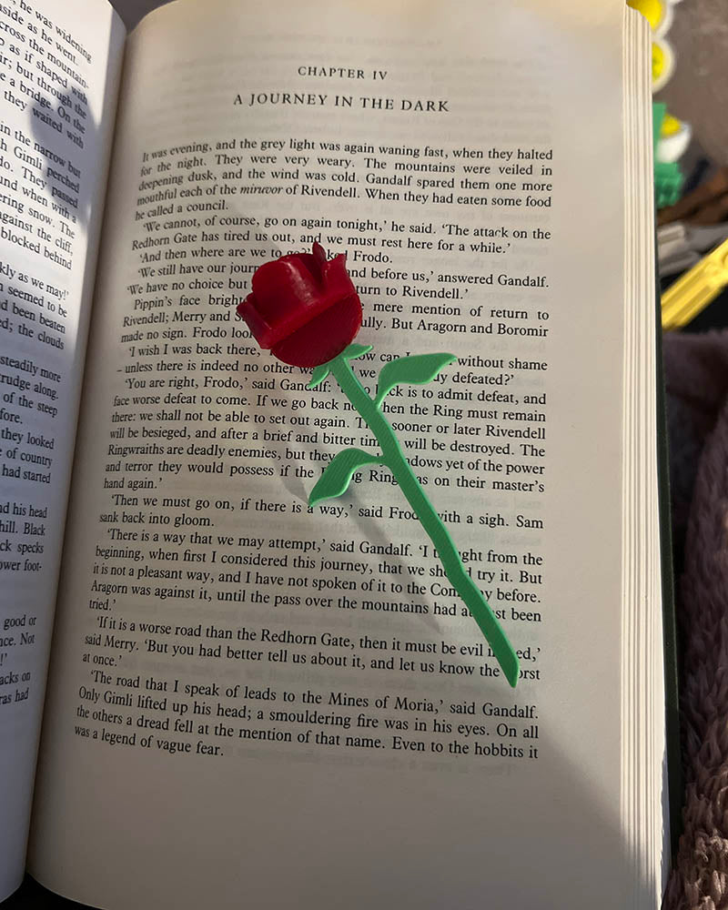 3D printed rose bookmark with detailed flower and thorn stem, Floral book accessory with a 3D rose peeking out of a book, Handmade rose bookmark gift for readers and book lovers