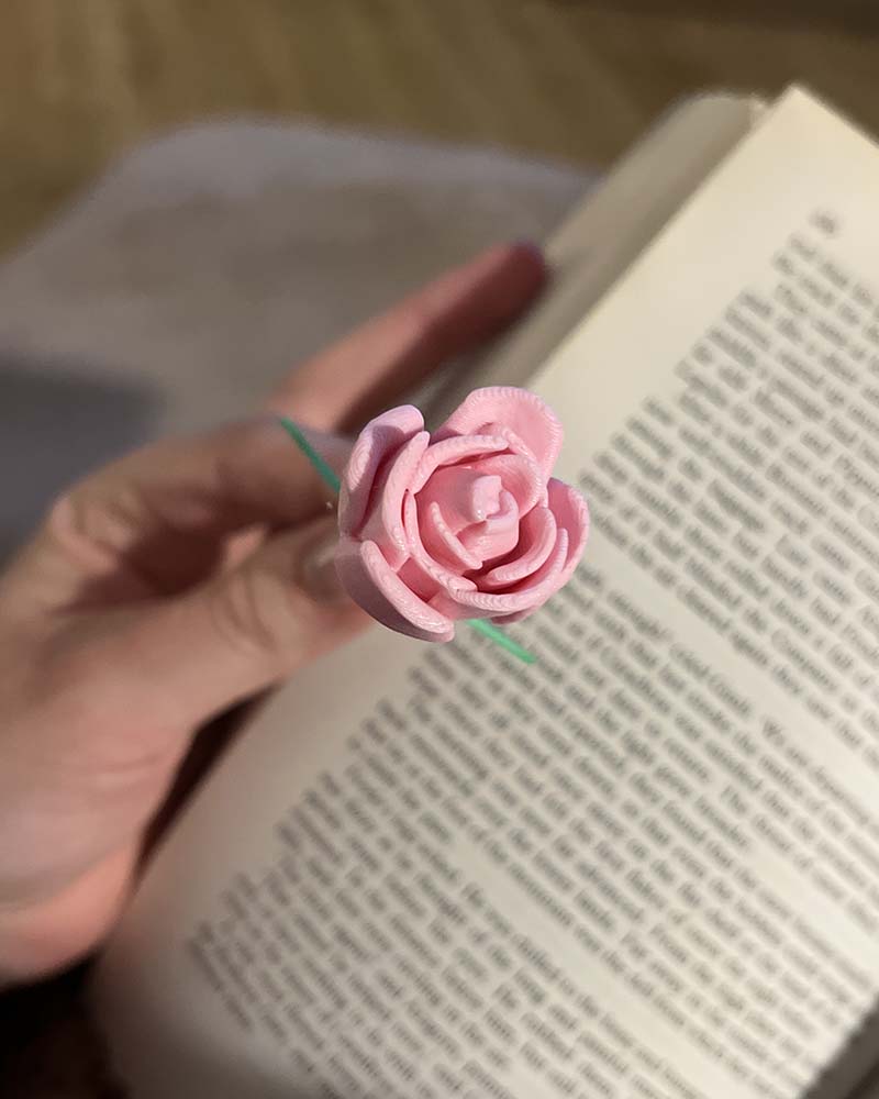 3D printed rose bookmark with detailed flower and thorn stem, Floral book accessory with a 3D rose peeking out of a book, Handmade rose bookmark gift for readers and book lovers