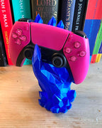 Blue geometric crystal hand for holding playstation console controller 