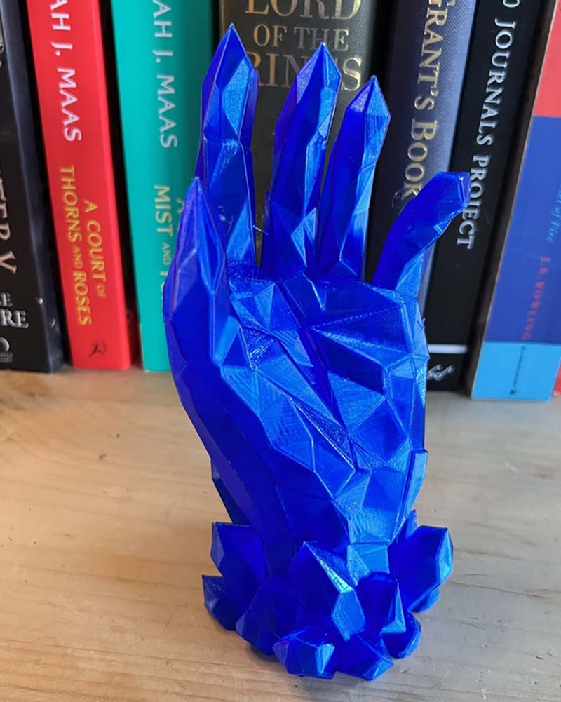 Blue geometric crystal hand console controller holder for playstation, xbox and switch