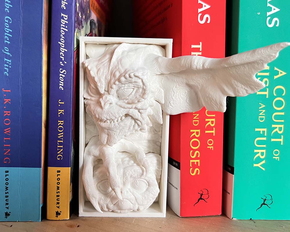 Close-up of detailed gremlin face with oversized ears and grin