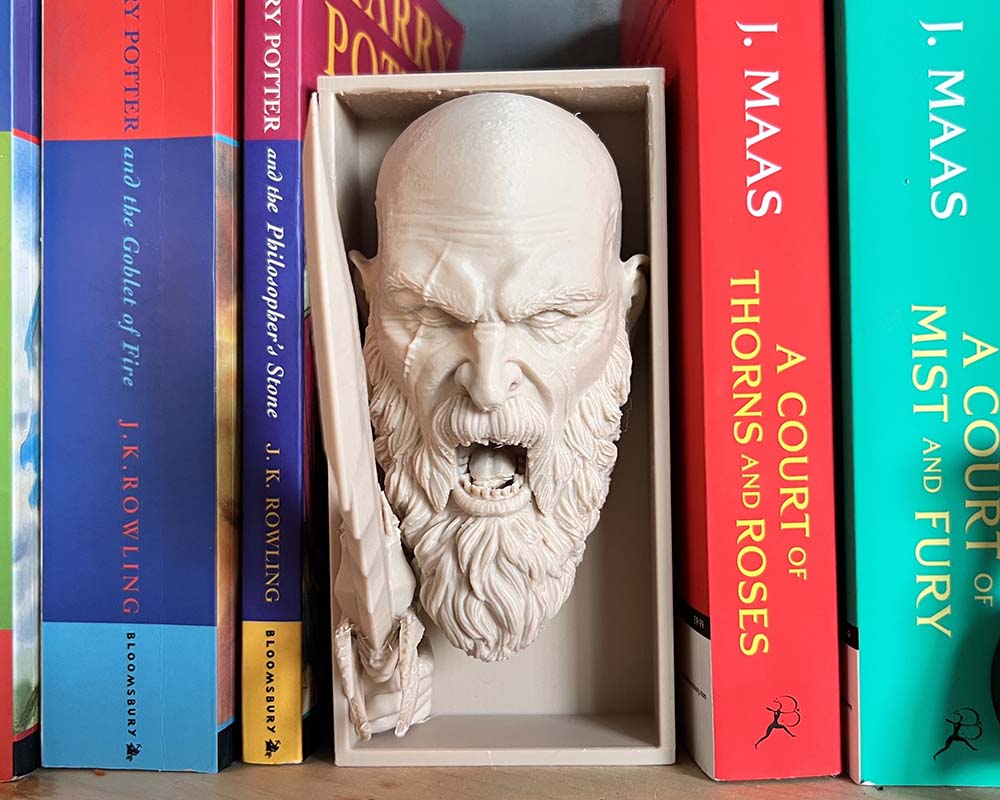 3D printed Kratos book nook with war cry pose and Leviathan Axe