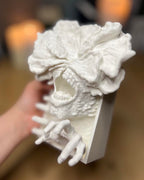 Hand holding the 3D printed Clicker figure for size reference. The last of us 2 clicker from the game