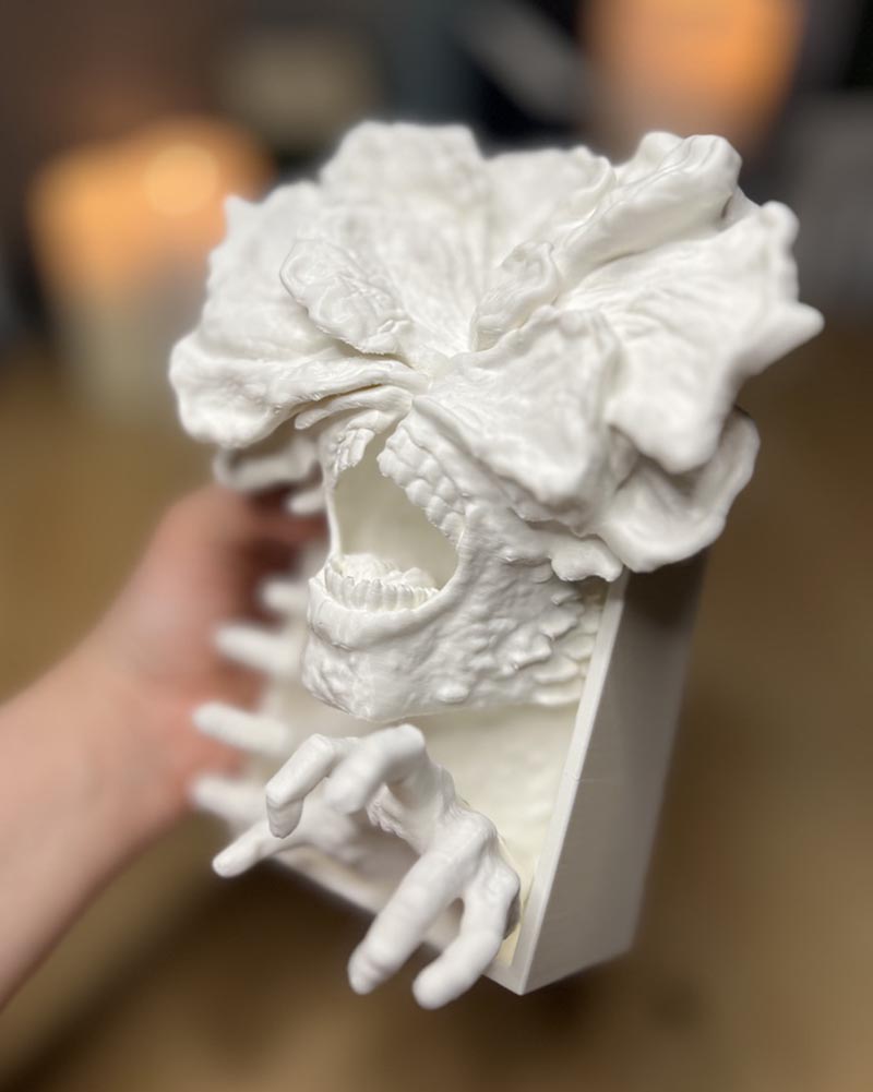 Hand holding the 3D printed Clicker figure for size reference. The last of us 2 clicker from the game