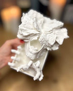 Overhead shot of horror-themed shelf featuring Clicker decor. Perfect present for the last of us fans 