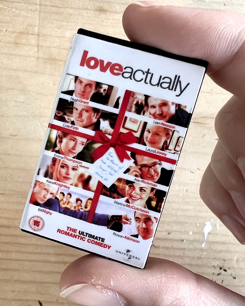 Mini VHS keychain retro 3D printed video tape 80s 90s nostalgic VHS tape keyring movie collectable Retro VHS style keychain for film fans and collectors Handmade VHS mini keychain accessory Vintage video tape replica fidget keyring love actually