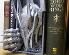 Close-up showing raw-textured detail on Sauron’s armoured hand