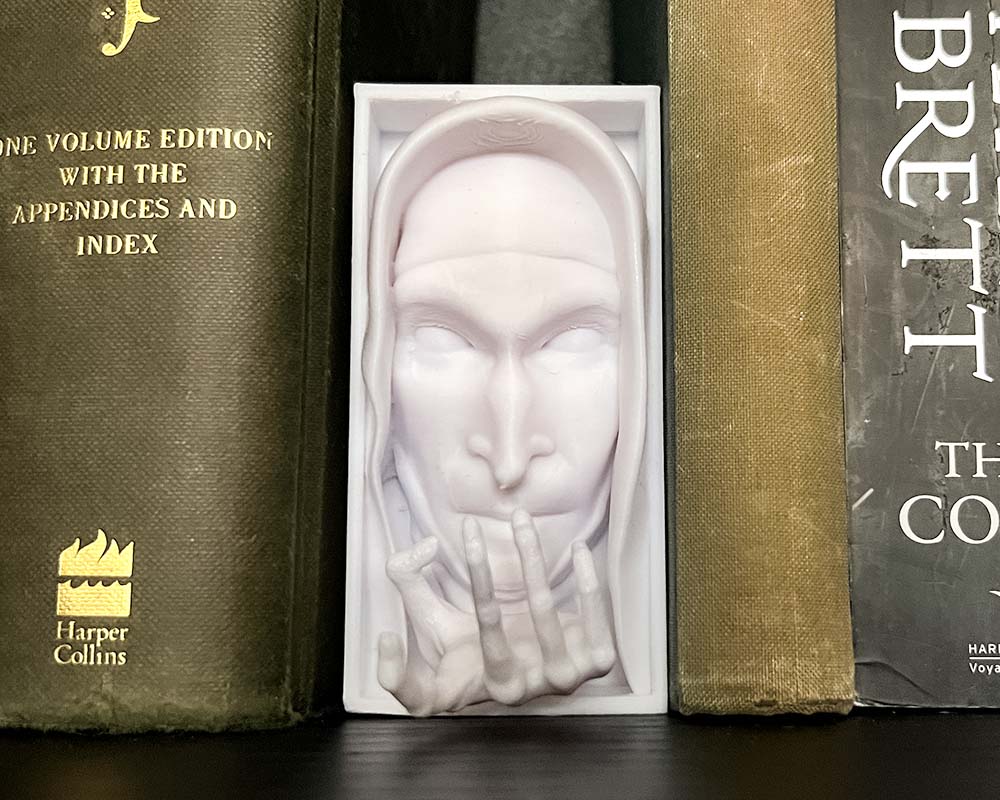 The Nun horror shelf insert with gothic decor