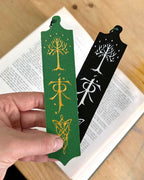 Hand holding Tolkien bookmark for scale and slimness