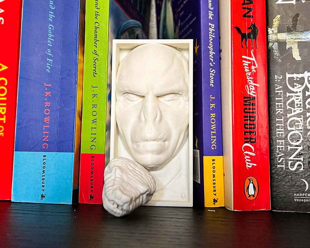 Voldemort book nook with snake and Elder Wand 3D printed Harry Potter inspired shelf insert Voldemort Dark wizard bookshelf décor with snake and wand Voldemort book nook gift for Harry Potter fans Wizarding world villain book nook insert for fantasy collectors