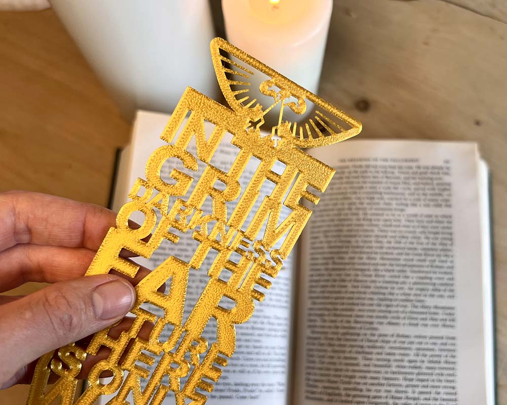 3D printed Warhammer bookmark with iconic grimdark quote and aquila in gold filament 
