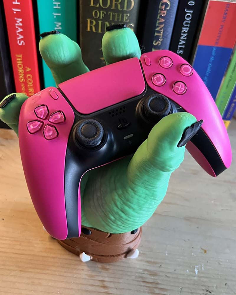 3D printed orc hand holding PlayStation controller