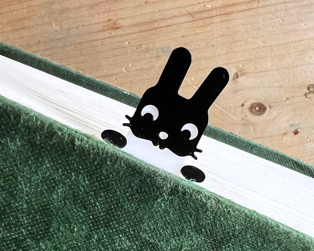 Black and white rabbit bookmark minimalist 3D design Cute bunny bookmark peeking out of book pages 3D printed rabbit page holder for book lovers