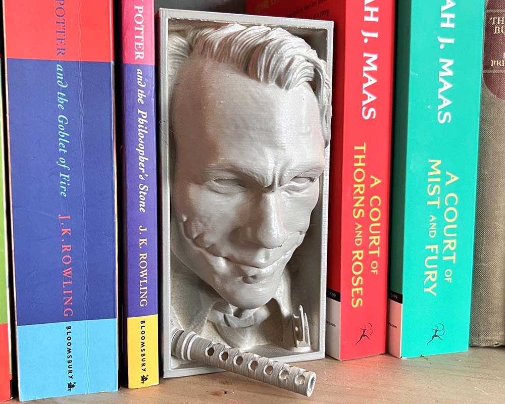 Joker book nook inspired by The Dark Knight 3D printed Joker shelf insert with sinister grin DC Comics villain bookshelf décor piece Dark Knight Joker book nook gift for collectors Gothic bookshelf insert featuring the Joker character